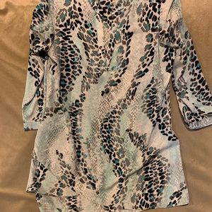 V neck tunic top. Animal prints with blue!